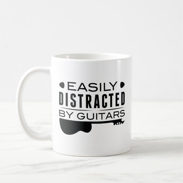 Lättspridd av gitarrer kaffemugg (Vänster)