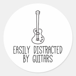 Lättspridd av gitarrer runt klistermärke