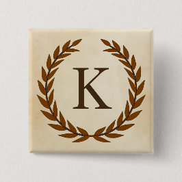 Laurbård på pergamentmonogram initial K Knapp