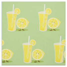 Le citronen och ett exponeringsglas av lemonade tyg