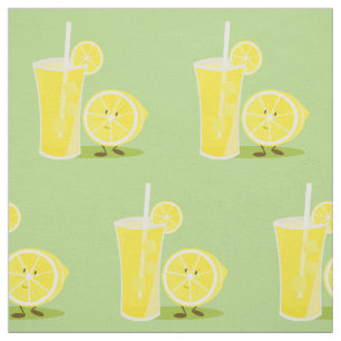 Le citronen och ett exponeringsglas av lemonade tyg
