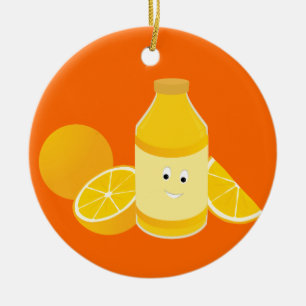 Le flaskan av orange fruktsaft med orangar julgransprydnad keramik