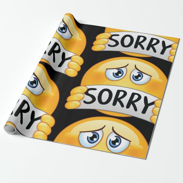 Ledsen ledsen emoji-ansikte som håller ett ursäktt presentpapper (Utrullad)