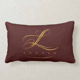 Legatodekorativ kudde (den bruna w-/goldlogotypen)