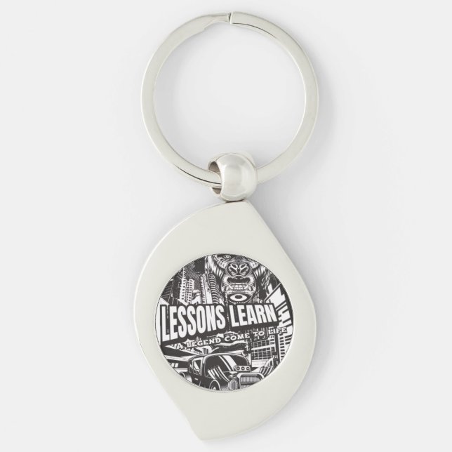LEGENDARY GORILLA LESSONS LEARN METAL KEYCHAIN  SWIRL SILVERFÄRGAD NYCKELRING (Framsidan)