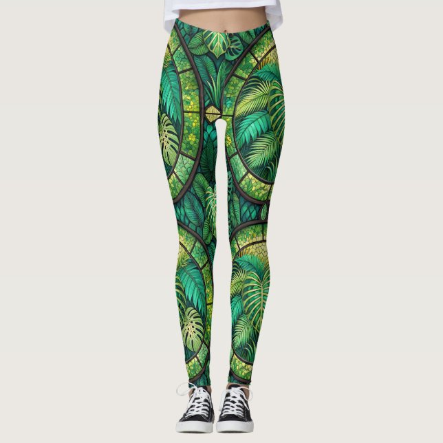 Leggings featuring a vibrant green tropical leaf  (Framsida)