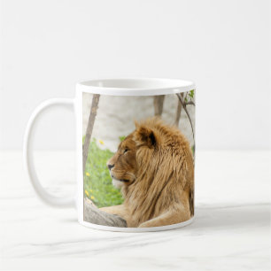 Lejon vila i gräs kaffemugg