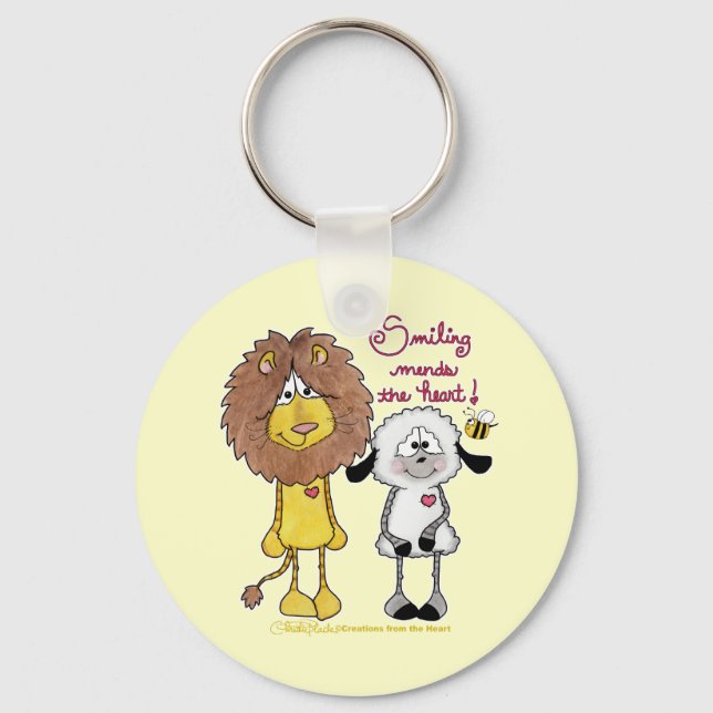 Lejona och lammhjärtfläckar nyckelring (Framsida)