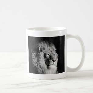 Lejont foto med svartvitt kaffemugg