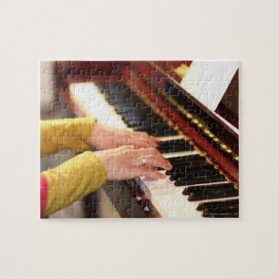 Leka pianot pussel