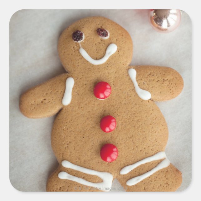 Lekande pepparkaksgubbe fyrkantigt klistermärke (Framsida)