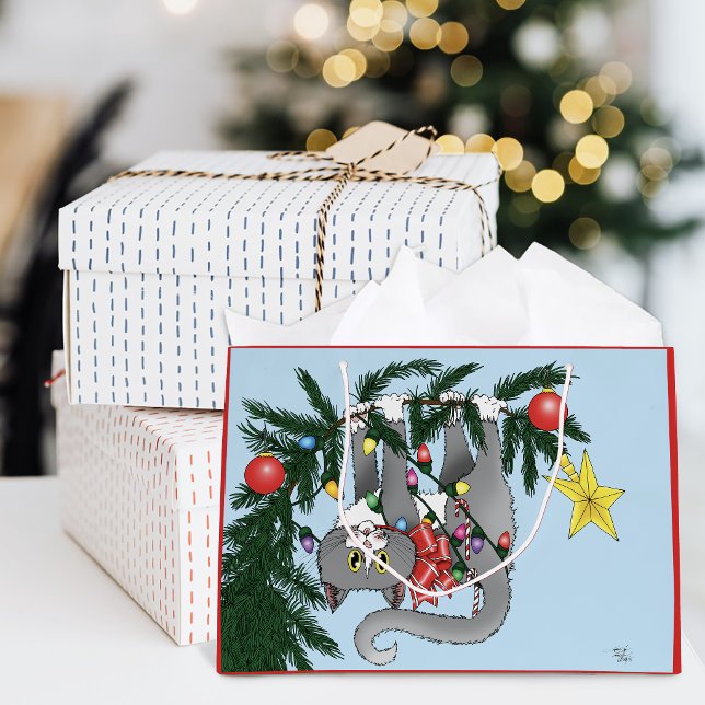 Lekfull hängande julgran grå katt (Skapare uppladdad)