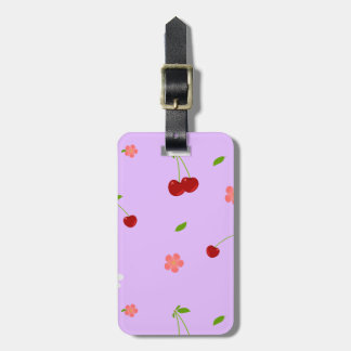 Lekfull körsbärsfrukt och blommig bakgrund bagagebricka
