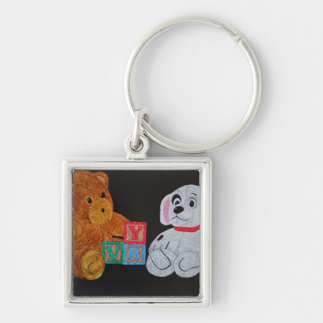 Lekkompisar Fyrkantig Silverfärgad Nyckelring (Framsidan)