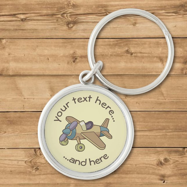 Leksaksflygplan Rund Silverfärgad Nyckelring (Skapare uppladdad)