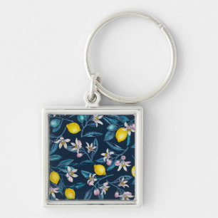 Lemon grenar med blommar och frukt i blått fyrkantig silverfärgad nyckelring