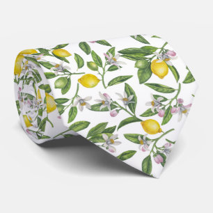 Lemon grenar med blommar och frukt på vitt slips