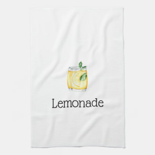 Lemonad i ett glas kökshandduk