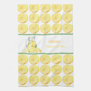 Lemonade i ett glastkökshandduk kökshandduk
