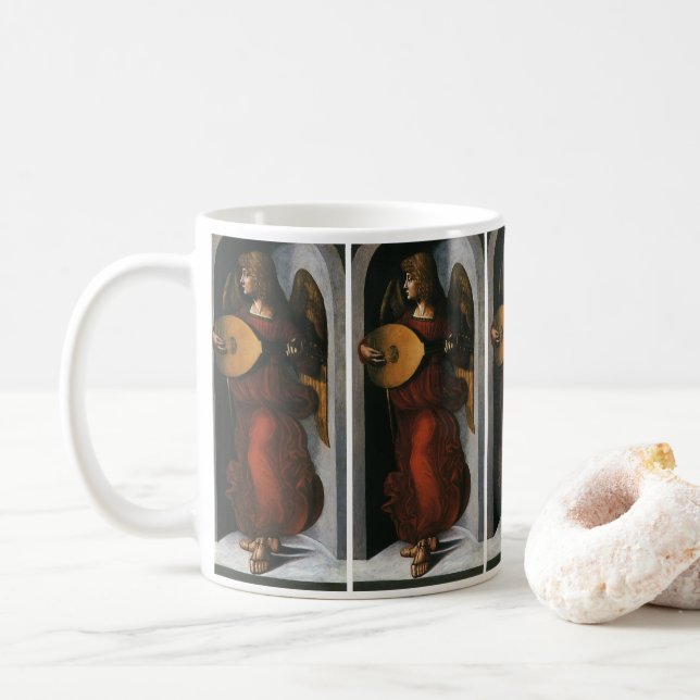 Leonardo da Vincis En ängel i rött med luta Kaffemugg (Med munk)