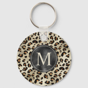 Leoparddjurtryck med svart falsk foliemonogram nyckelring