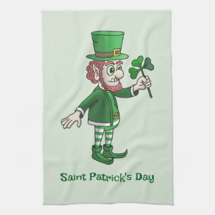 Leprechaunen med en shamrock kökshandduk