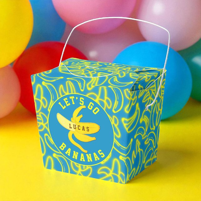 Let's Go Bananas Party Presentaskar (Bright ‘Let’s Go Bananas’ favor box with neon fruit pattern and custom name.)