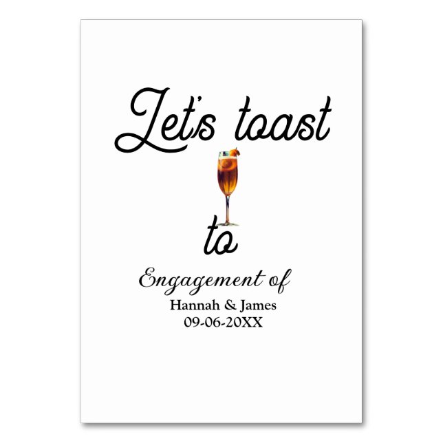 Let's toast to engagement party name date glass bordsnummer (Framsidan)