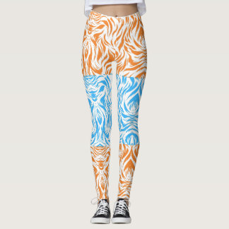 Levande apelsin- och blå abstrakt virvelmönster be leggings
