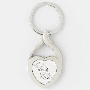 Levande kärlekskratt twisted heart silverfärgad nyckelring