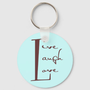 Levande. Skratt. Love. Nyckelring