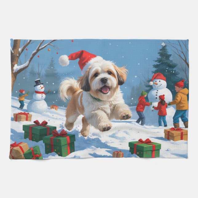 Lhasa Apso springer i snö med julhatt Kökshandduk (Horisontell)