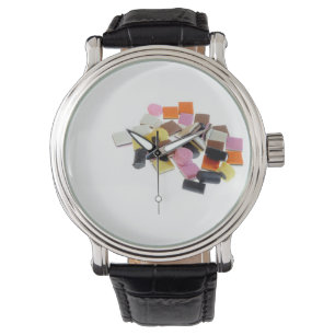 Licoricandy med kopieringsutrymme armbandsur