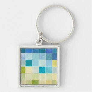Liggande med flerfärgade pixelrutor fyrkantig silverfärgad nyckelring