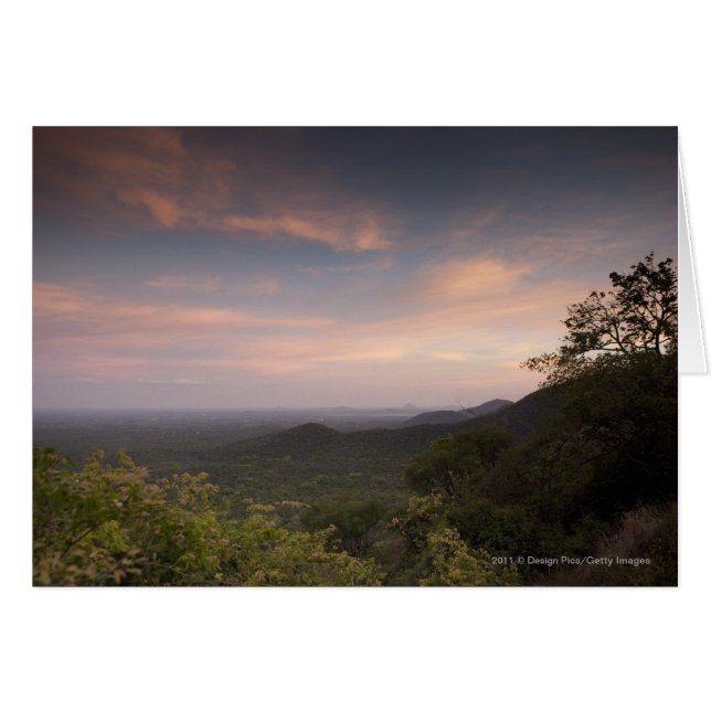 Liggande under en solnedgång hälsningskort (Framsidan Horizontal)