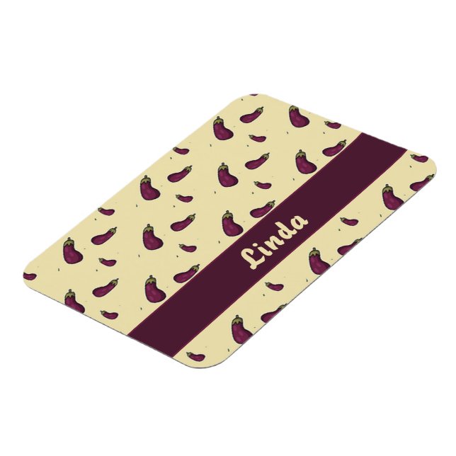 Lila av äggplantor på gult magnet (Vänstra Sidan)