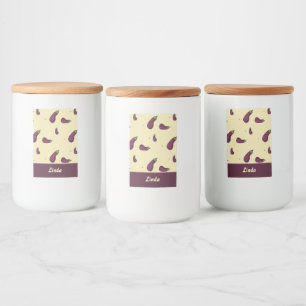 Lila av äggplantor på gult mat etikett