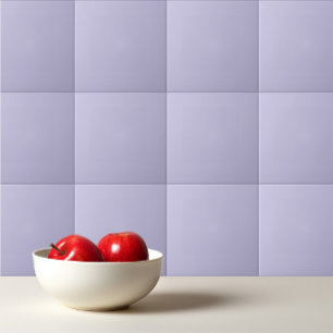 Lila av fast läderpastellmassa på färg kakelplatta