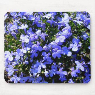 Lila blommor musmatta