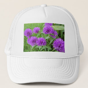 lila blommor truckerkeps
