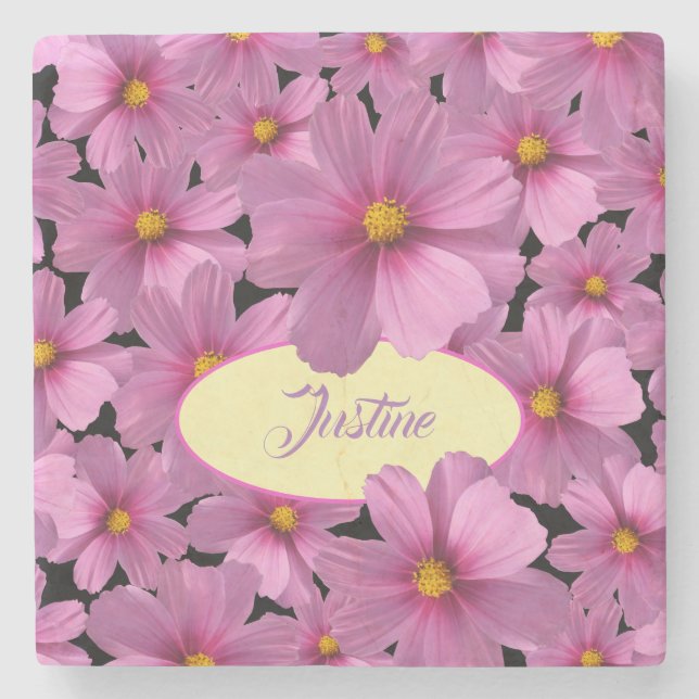 Lila Cosmos blommdesign i en svart bakgrund Stenunderlägg (Framsidan)