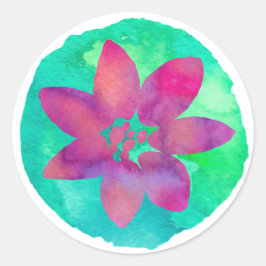 Lila flerfärgad tropisk blomma runt klistermärke