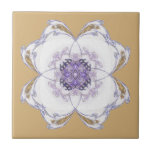 Lila, Guld Blommigt-look Fractal Art Golden Kakelplatta<br><div class="desc">En formgivning av konst i lila och guld är centrerad på den här plattan. Blommigten ser ut. Bakgrunden är gyllene. Matchande badrumstillbehör finns tillgängliga.</div>