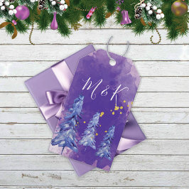 Lila julgran gyllene snöflingor presentetikett