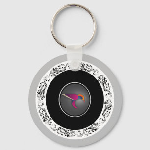 Lila kolibri dekorativ cirkeldesign nyckelring