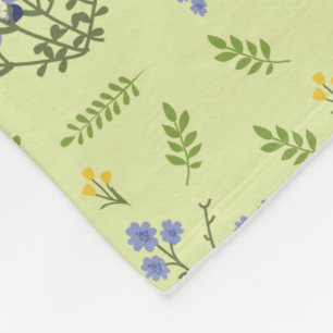 lila och gula blommor mönster fleecefilt