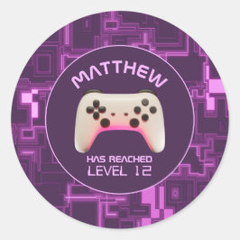 Lila- och vit videospelskontroll runt klistermärke