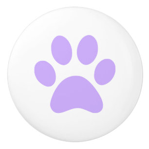 Lila pawprint för lilatasstryck knopp