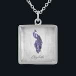 Lila Peacock Necklace Sterling Silver Halsband<br><div class="desc">Anpassa en unik gåva till dina brudar med Lila Peacock Necklace. Necklace-konstruktionen har en levande påle som vilar på en känslig vit bladvind mot en grym bakgrund. Anpassa med brudgummens namn för en omhuldad påminnelse om din stora dag. Ytterligare bröllop-förråd finns även med den här utformningen.</div>