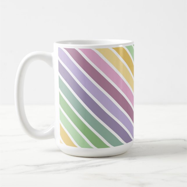 LILA ROSA GRÖN GUL PÅSKRANDIG KAFFEMUGG (Vänster)